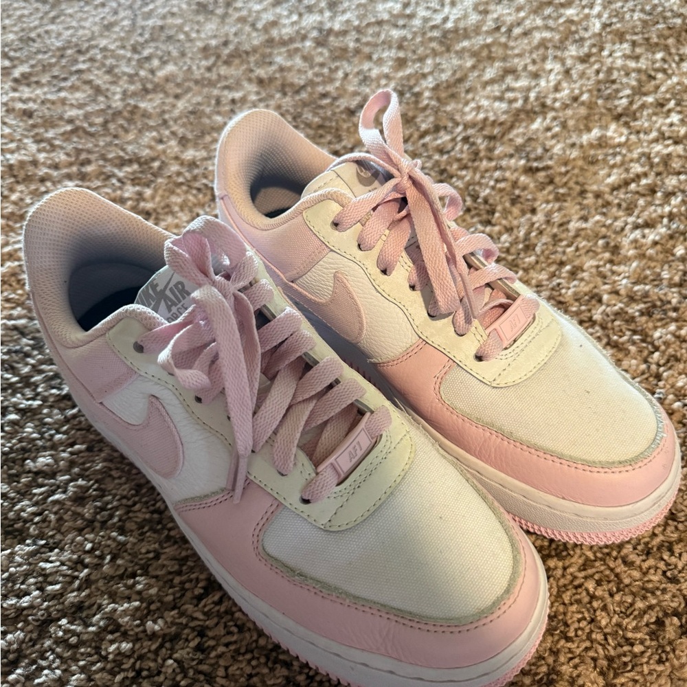 Pink and White Nike Low-Top Sneakers